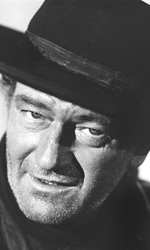 In foto John Wayne (116 anni) Dall'articolo: Storia 'poconormale' del cinema: quei magnifici anni Cinquanta.