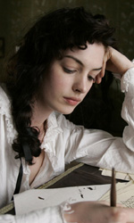 In foto Anne Hathaway (41 anni) Dall'articolo: Film in Tv: Il giro del mondo in una settimana.