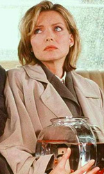 In foto Michelle Pfeiffer (66 anni) Dall'articolo: Un giorno, per caso, il film stasera in tv su Nove.