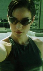 In foto Carrie-Anne Moss (57 anni) Dall'articolo: Matrix, il film stasera in tv su Italia 2.