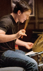 In foto Miles Teller (37 anni) Dall'articolo: Whiplash, un'opera ruvida e dura sulla ricerca distruttiva del successo.